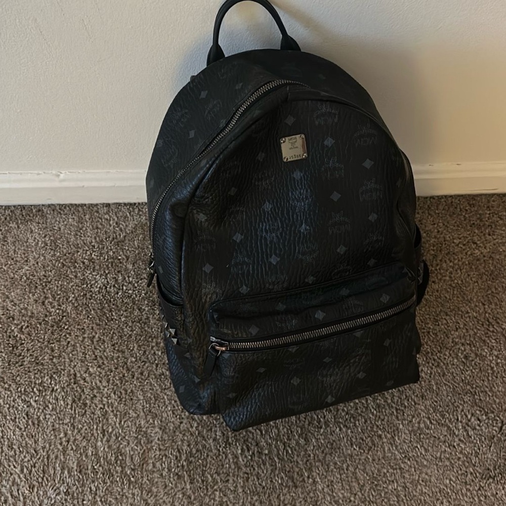 MCM Black Monogram Backpack with Dome Shape and Structured Design